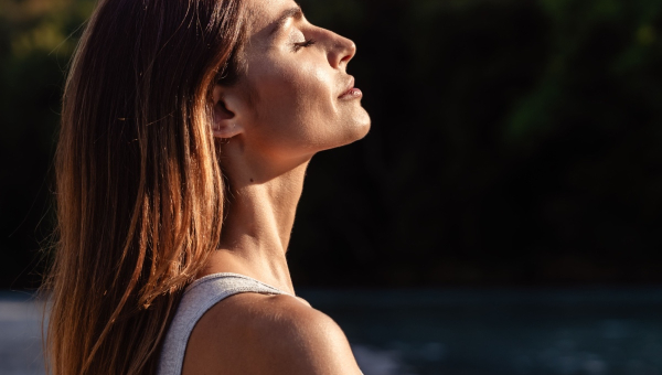 A woman finding peace before undergoing Kingwood IVF